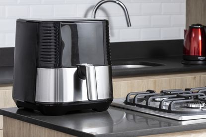 Air fryer on kitchen worksurface