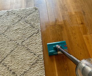 Cleaning a wood floor with the Dyson V15s Detect