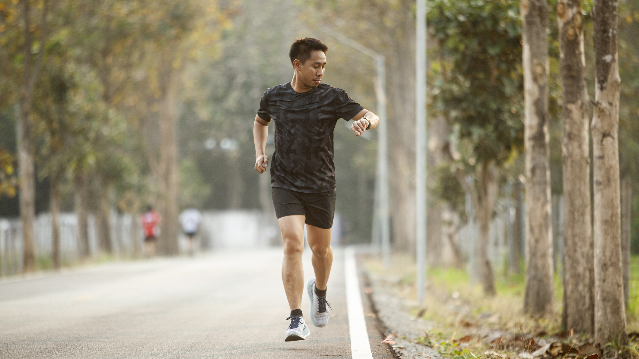 Runner looking at his watch