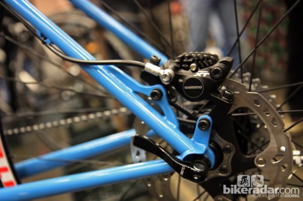Soulcraft's two-piece disc caliper mount lends a minimal look to the rear end of this mountain bike.