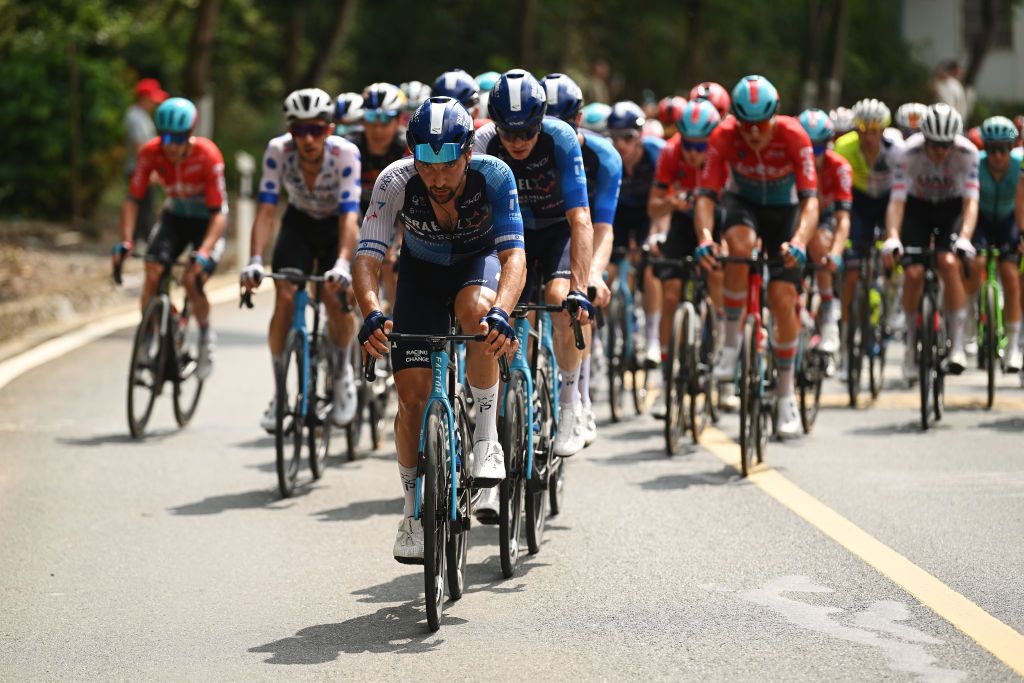 JINCHENGJIANG CHINA OCTOBER 18 Guy Sagiv of Israel and Team Israel Premier Tech leads the peloton during the 5th GreeTour Of Guangxi 2024 Stage 3 a 1768km stage from Bama to Jinchengjiang UCIWT on October 18 2024 in Jinchengjiang China Photo by Dario BelingheriGetty Images