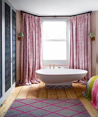Bathroom curtain ideas with egg-shaped bathtub and pink patterned curtains