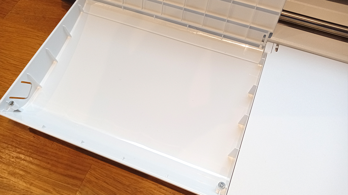 A photo of the Brother ScanNCut SDX2200 tray open