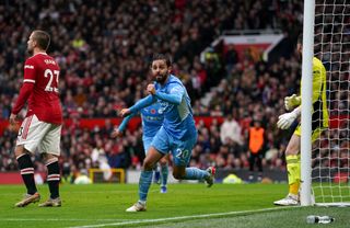 Bernardo Silva celebrates scoring Manchester City's second goal at Manchester United (Martin Rickett/PA).
