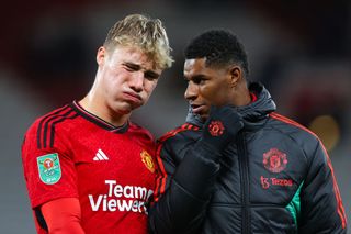 Rasmus Hojlund of Manchester United reacts as he speaks with Marcus Rashford during the Carabao Cup Third Round match between Manchester United and Crystal Palace at Old Trafford on September 26, 2023 in Manchester, England. (Photo by James Gill - Danehouse/Getty Images)