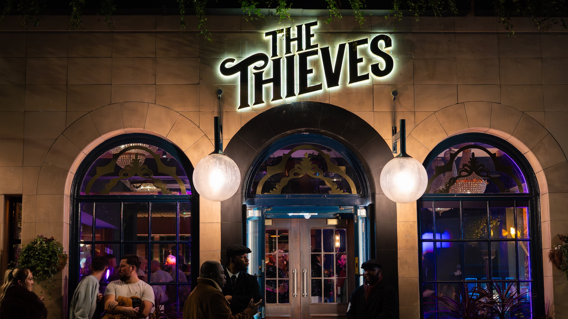 The Thieves front door and sign 
