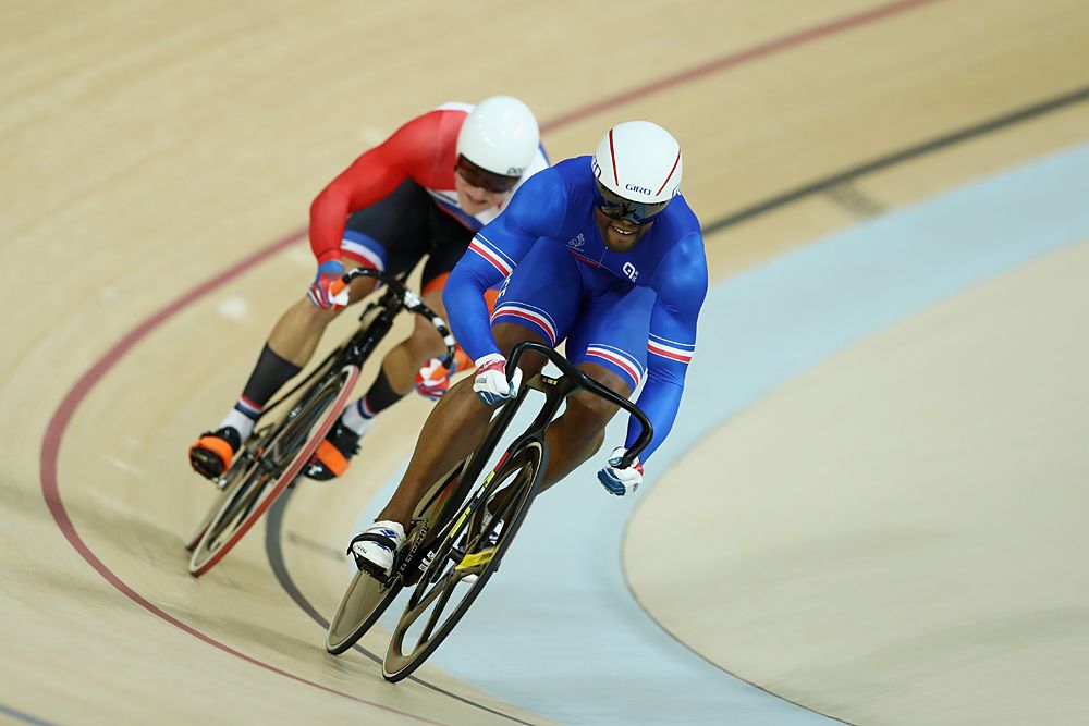 Gregory Bauge of France (R) and Jeffrey Hoogland of the Netherlands compete during the Men's Sprint 1/8 Finals on Day 8