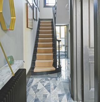 marble hallway flooring with stairs