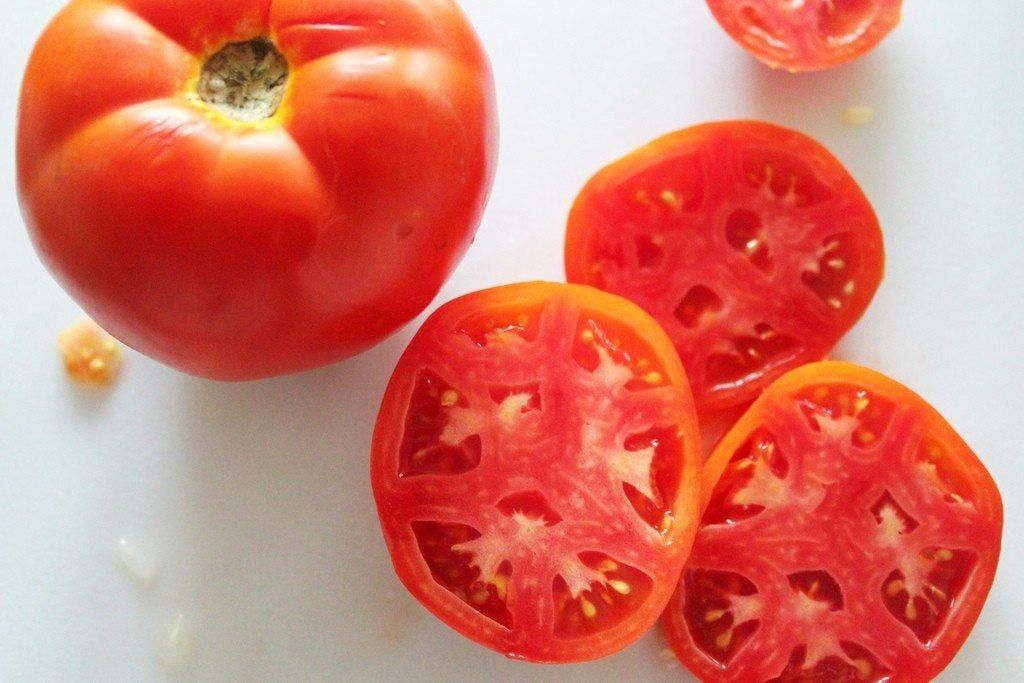 Whole And Sliced Tomato Fruits