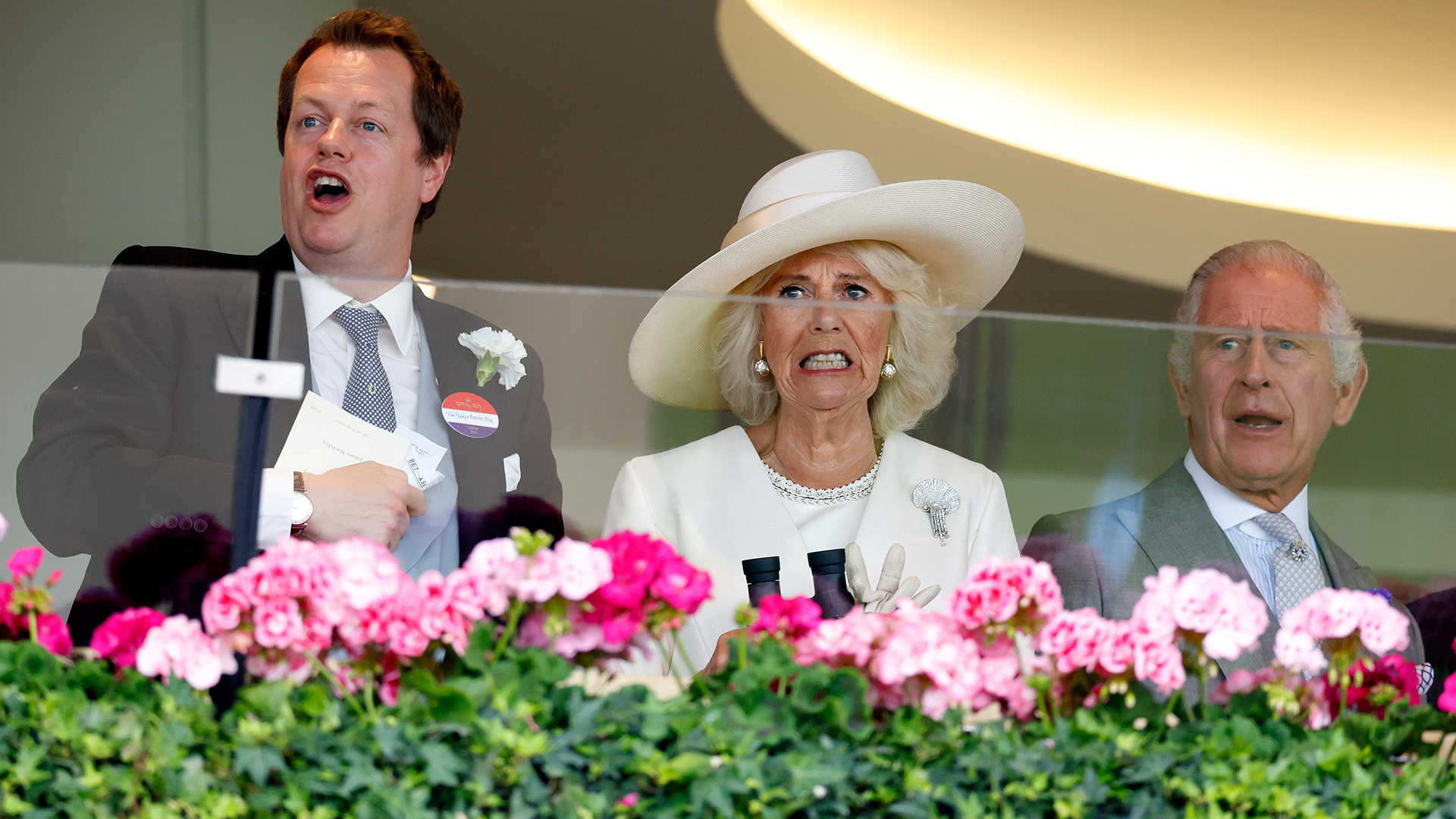 ASCOT, UNITED KINGDOM - JUNE 20: (EMBARGOED FOR PUBLICATION IN UK NEWSPAPERS UNTIL 24 HOURS AFTER CREATE DATE AND TIME) Tom Parker Bowles, Queen Camilla (wearing the Courtauld Thomson Scallop-Shell Brooch, which was worn by both Queen Elizabeth, The Queen Mother and Queen Elizabeth II) and King Charles III watch the racing on day one of Royal Ascot 2023 at Ascot Racecourse on June 20, 2023 in Ascot, England. (Photo by Max Mumby/Indigo/Getty Images)