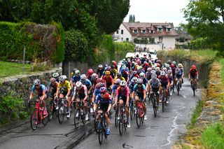 MORGES SWITZERLAND SEPTEMBER 08 LR Lotte Kopecky of Belgium and Team SD Worx Protime Yellow Leader Jersey Julie Bego of France and Cofidis Women Team Erica Magnaldi of Italy and UAE Team ADQ Grace Brown of Australia and Team FDJ SUEZ and a general view of the peloton competing during the 3rd Tour de Romandie Feminin 2024 Stage 3 a 1442km stage from Morges to Morges UCIWWT on September 08 2024 in Morges Switzerland Photo by Luc ClaessenGetty Images