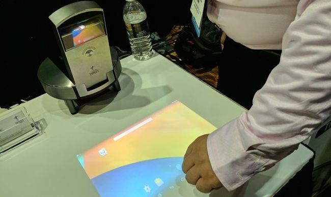 This Computer Projects a Touch Screen Onto Any Surface | Laptop Mag