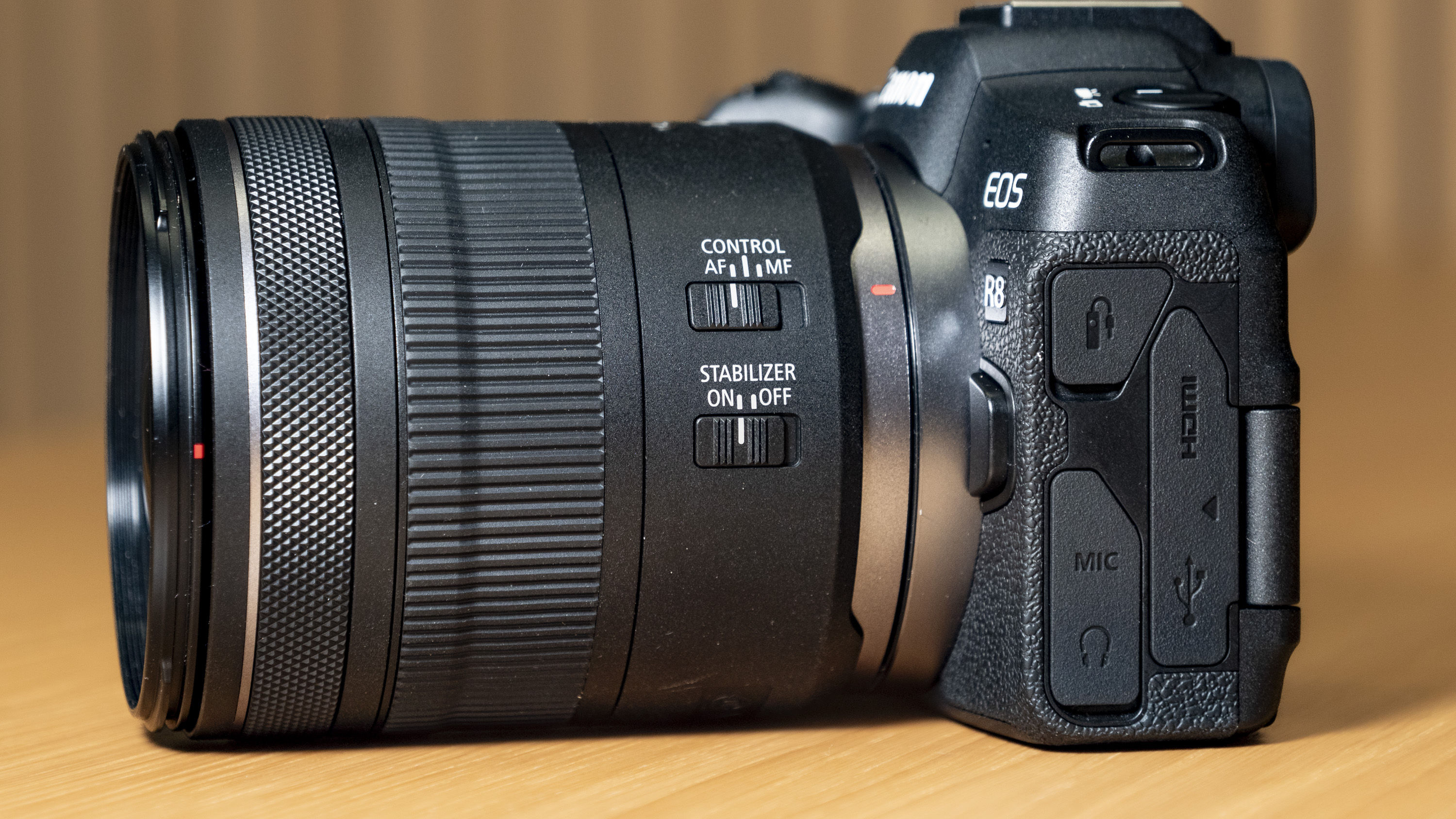 Close up of the switches and controls on the Canon RF 16-28mm F2.8 IS STM lens