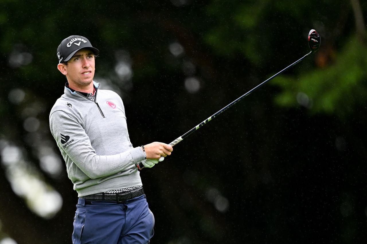 Tom McKibbin watches his tee shot with a fairway wood
