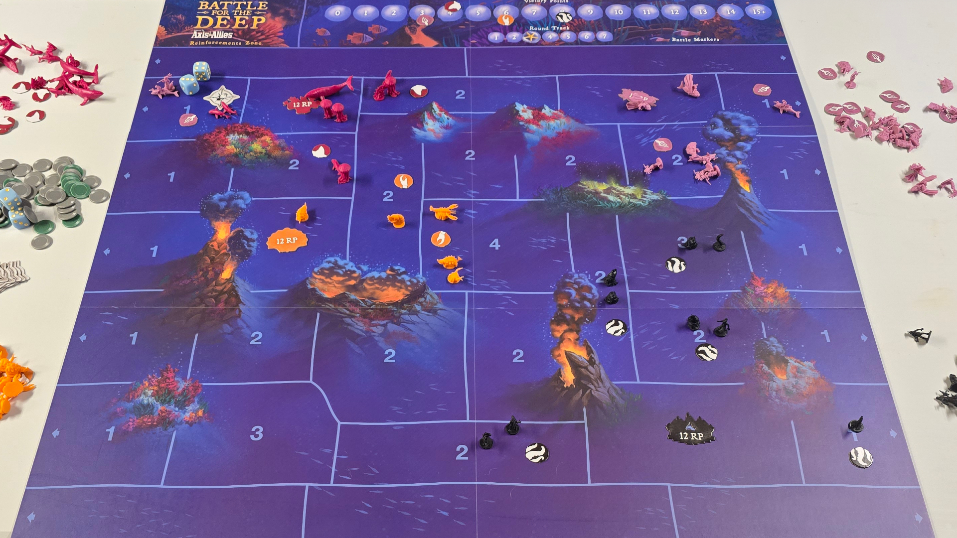 Battle for the Deep board, components, and tokens laid out on a white surface