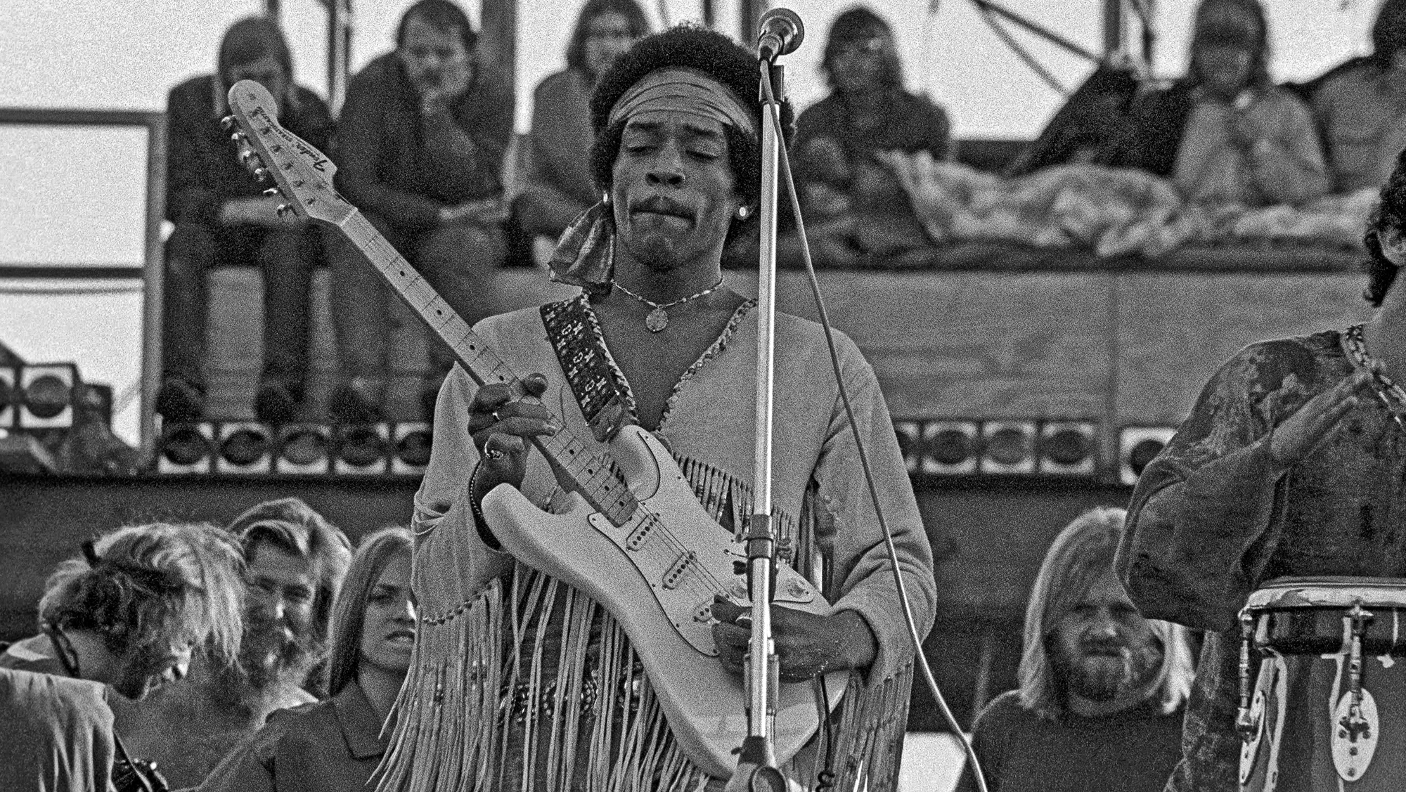 Jimi Hendrix performing his legendary 2 hour performance at Woodstock Music &amp; Arts Festival held on Sam Yasgur's alfalfa field in Sullivan County in Bethel, New York on August 18, 1969.