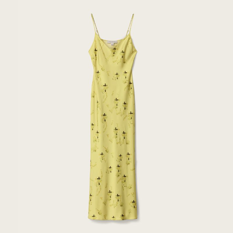 A yellow slip dress by All Saints