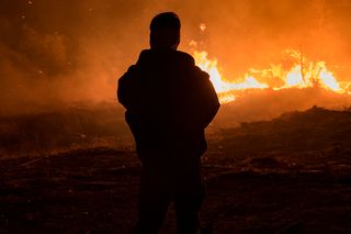 The Creek Fire burns in Los Angeles, California on December 5, one of several wildfires threatening the Los Angeles area.