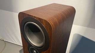 Close up on wood finish on Q Acoustics 3050c speaker