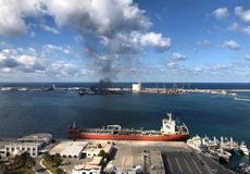 TRIPOLI, LIBYA - FEBRUARY 18: Smoke rises after warlord Khalifa Haftarâs forces launched an attack on a port near the Martyrs' Square, where celebration events marking the 9th anniversary of 