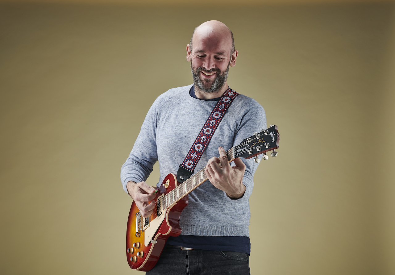 A happy Chris Bird playing a LEs Paul