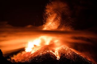 Mount Etna has almost continuous eruptive activity near the summit craters and in the Valle del Bove, but these vertical eruptions pose little threat to nearby towns.