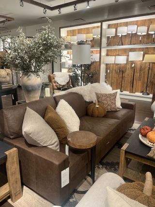 leather sofa inside Pottery Barn store