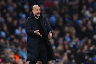 Manchester City boss Pep Guardiola looks on during his sides 2-0 FA Cup success against Newcastle United.