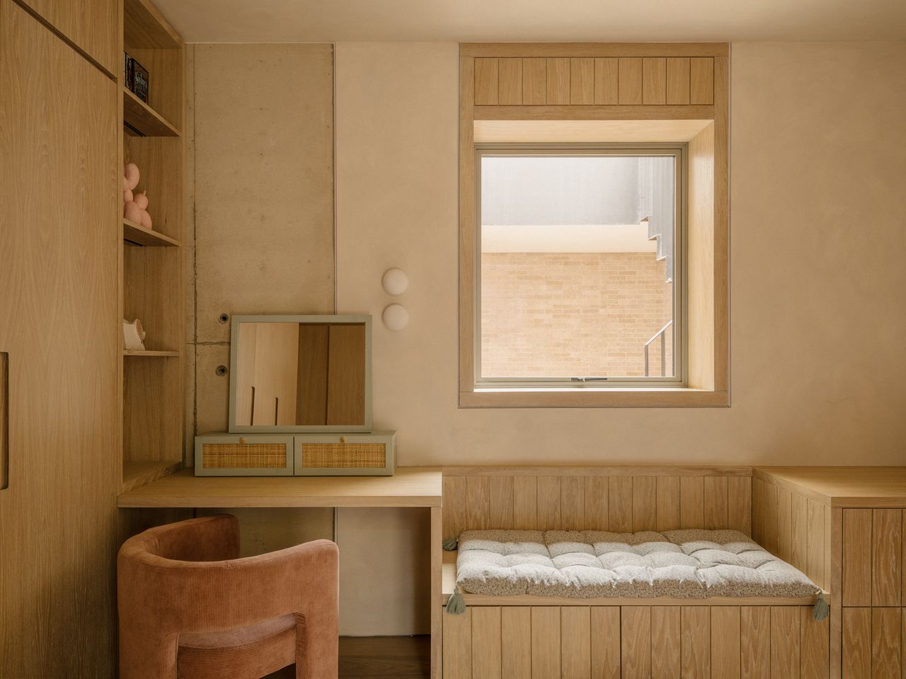 Two of the bedrooms in Green Lodge, each showing the built-in furniture