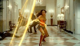 Gal Gadot swinging lasso in Wonder Woman 1984