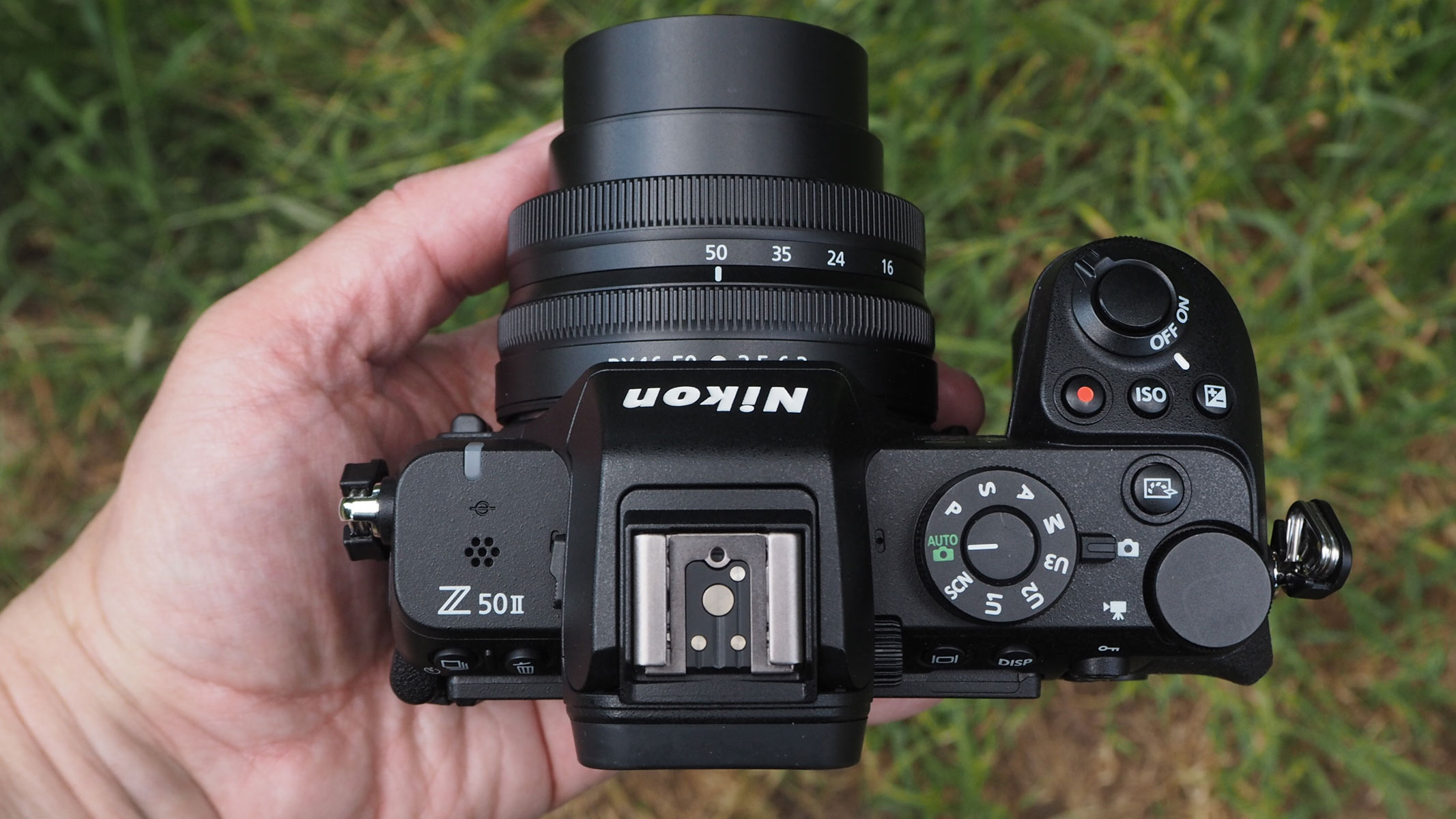 The controls of the Nikon Z50 II shown in a bird&#039;s eye view.