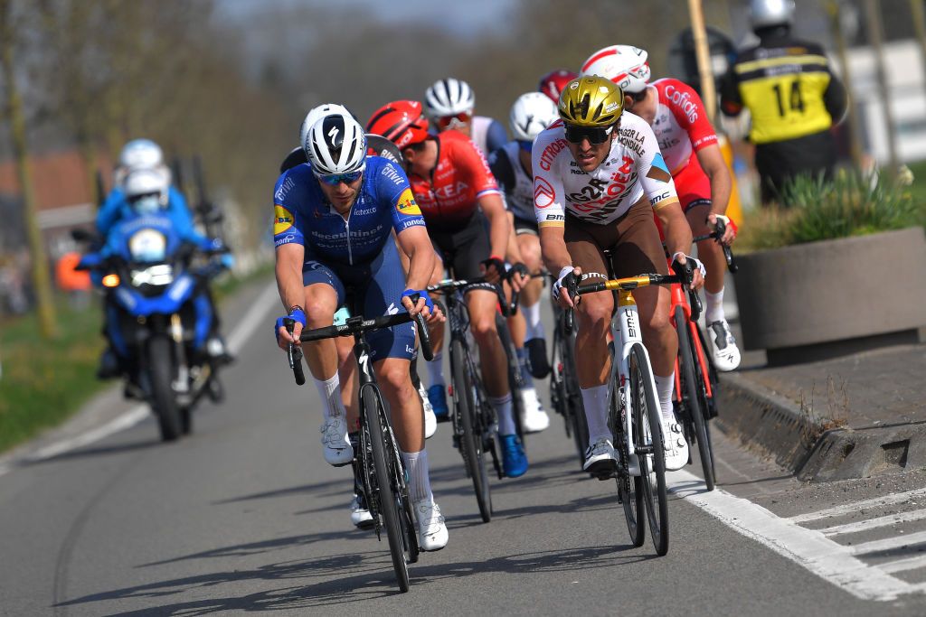 WAREGEM BELGIUM MARCH 31 Florian Senechal of France and Team Deceuninck QuickStep Greg Van Avermaet of Belgium and Team AG2R Citren Team during the 75th Dwars Door Vlaanderen 2021 Mens Elite a 1841km race from Roeselare to Waregem DDV DDV21 FlandersClassic A travers la Flandre on March 31 2021 in Waregem Belgium Photo by Luc ClaessenGetty Images