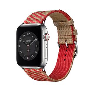 Hermes Kraft/Rouge de Coeur Jumping Single Tour Apple Watch strap against a white background