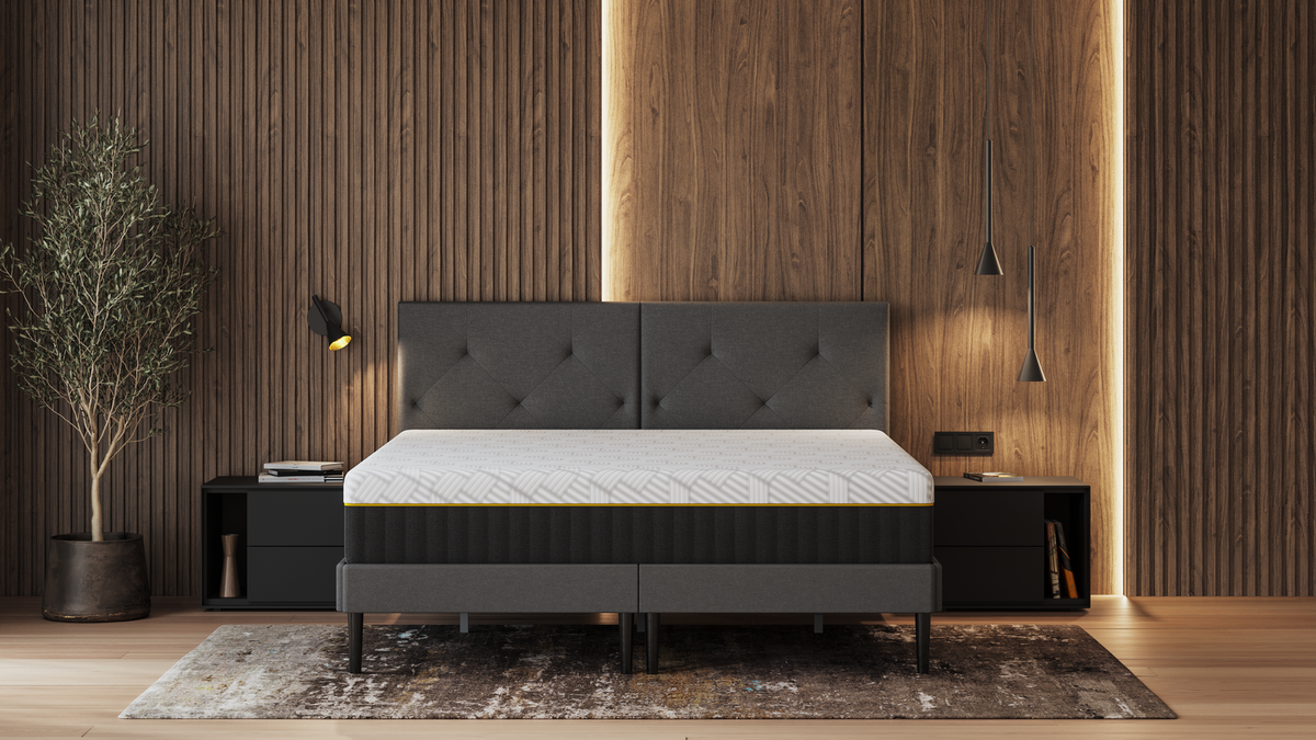 The Emma Elite Mattress on a bed frame in a bedroom