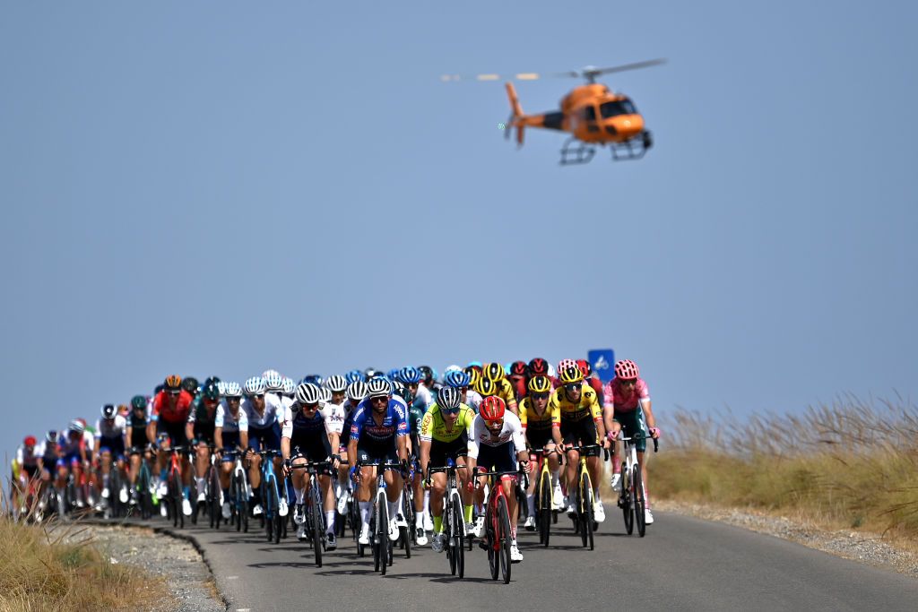 CABO DE GATA SPAIN AUGUST 31 A general view of Lukasz Owsian of Poland and Team Arka Samsic and Julien Bernard of France and Team Trek Segafredo lead the peloton during the 77th Tour of Spain 2022 Stage 11 a 1912km stage from ElPozo Alimentacin Alhama de Murcia to Cabo de Gata LaVuelta22 WorldTour on August 31 2022 in Cabo de Gata Spain Photo by Justin SetterfieldGetty Images