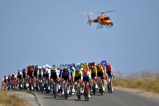 CABO DE GATA SPAIN AUGUST 31 A general view of Lukasz Owsian of Poland and Team Arka Samsic and Julien Bernard of France and Team Trek Segafredo lead the peloton during the 77th Tour of Spain 2022 Stage 11 a 1912km stage from ElPozo Alimentacin Alhama de Murcia to Cabo de Gata LaVuelta22 WorldTour on August 31 2022 in Cabo de Gata Spain Photo by Justin SetterfieldGetty Images