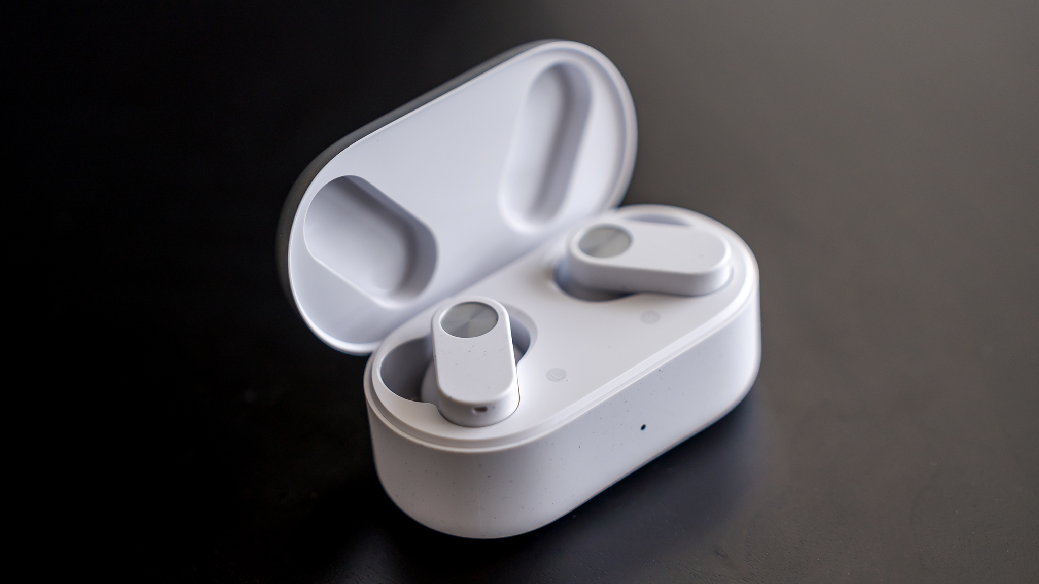 OnePlus Nord Buds 2 earbuds open in case.