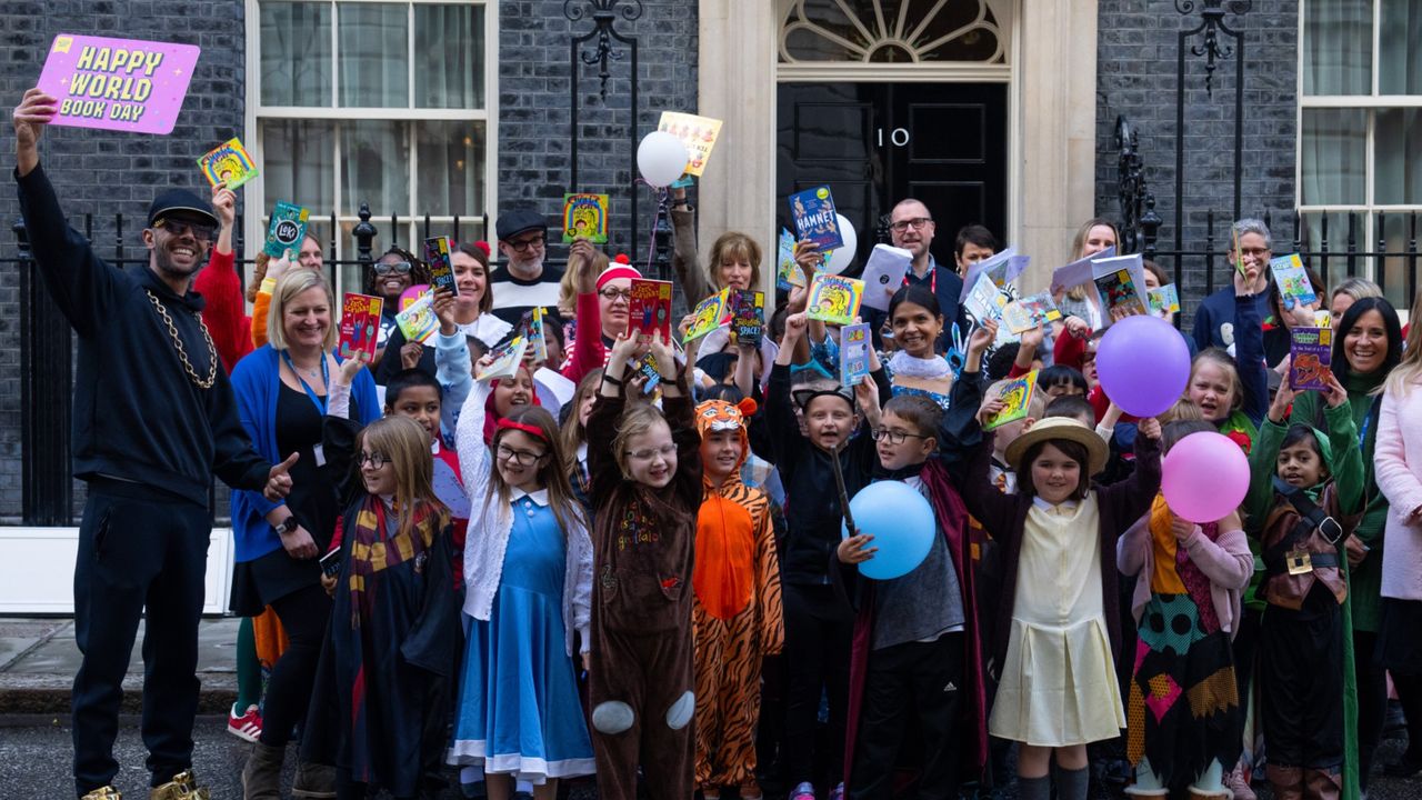 Akshata Murty, the wife of Rishi Sunak, poses for photographs with schoolchildren dressed up as book characters outside 10 Downing Street to mark World Book Day on 1 March, 2024