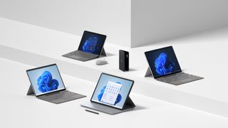 A photograph of the new Microsoft Surface family devices on a white backdrop