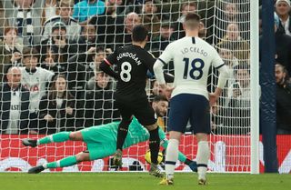 Manchester City’s Ilkay Gundogan has his penalty saved by Tottenham goalkeeper Hugo Lloris