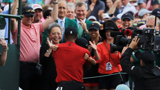 Tiger Woods embracing Kultida Woods after winning the 2019 Masters