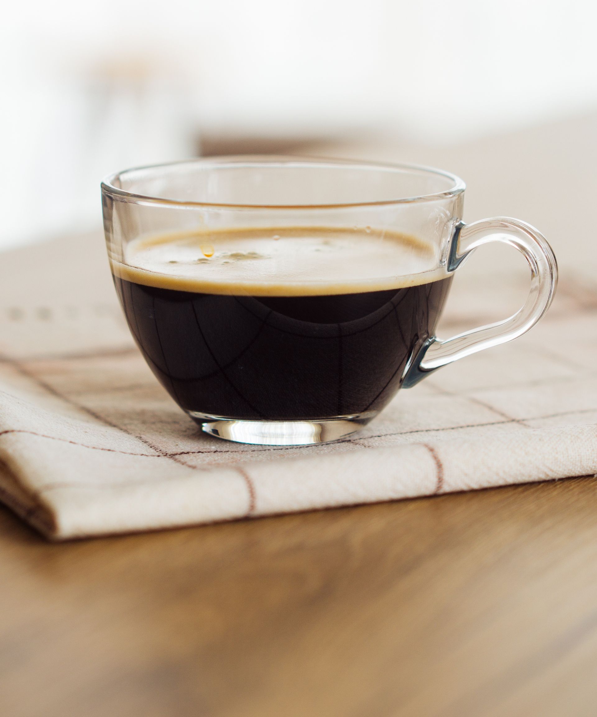 Black coffee on a wooden table
