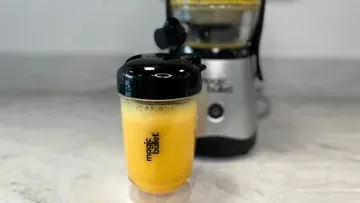 Orange juice made in the Magic Bullet Mini Juicer