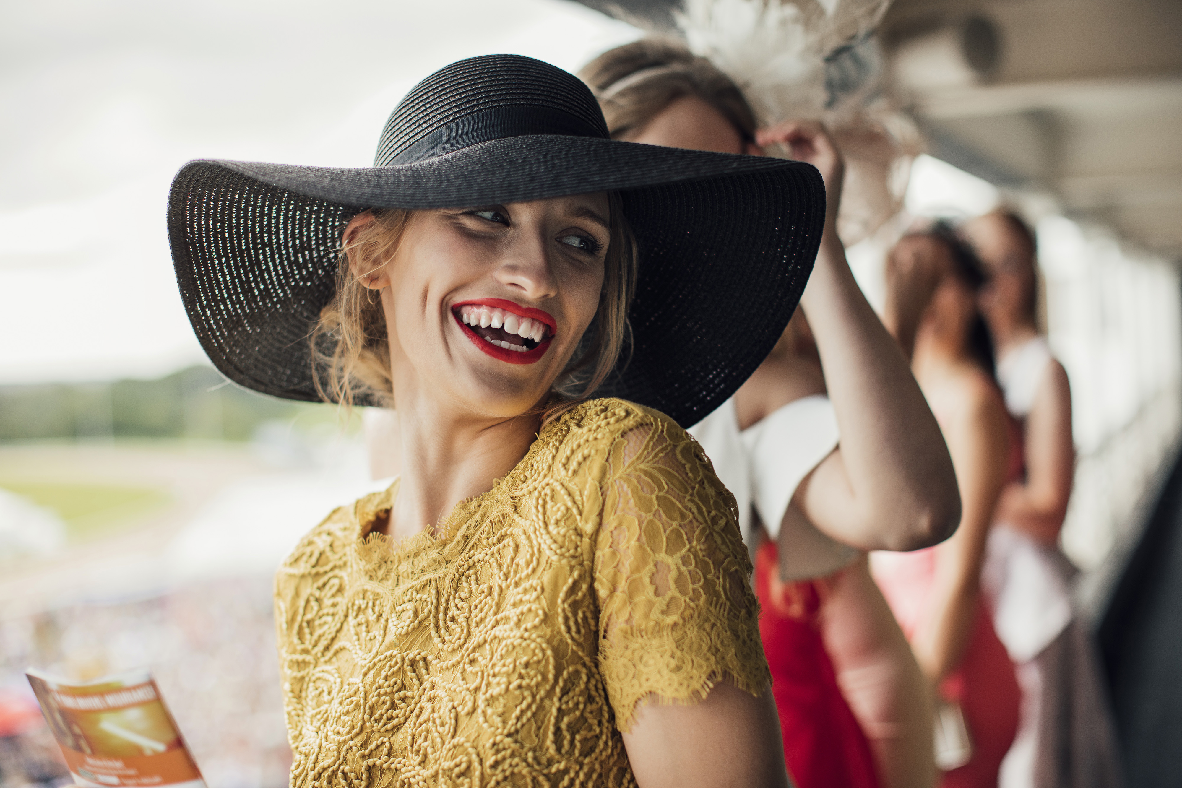 Special events and Ladies Days mean lots of glamour and style so use your portrait lens capture this with a wide aperture.