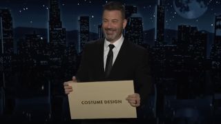 Jimmy Kimmel holding up a comically large Oscars envelope on Jimmy Kimmel Live!