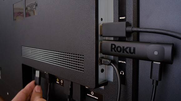 The Roku Streaming Stick Plus in a TV.
