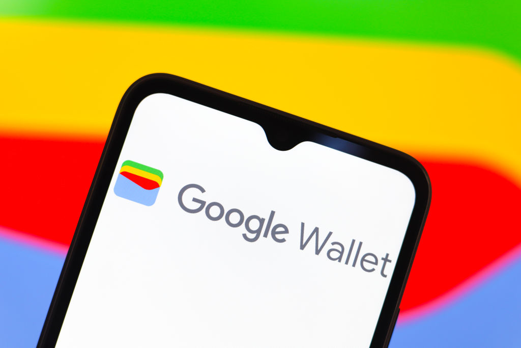 Google Wallet logo on a mobile phone screen.