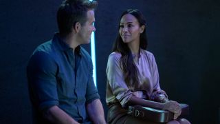 Zoe Saldana and Ryan Reynolds meet in a futuristic classroom in The Adam Project.