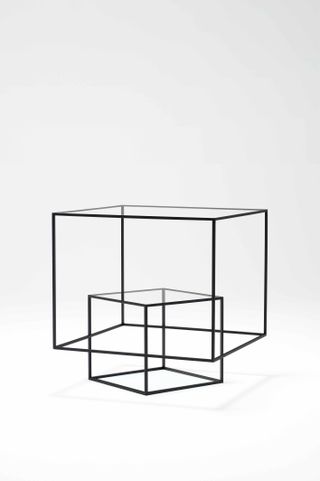 Thin Black Tables by Nendo for Cappellini on white background