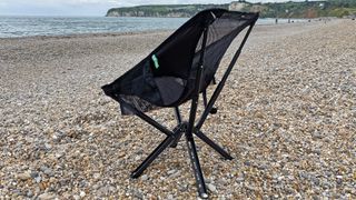 Sitpack Campster II portable camping chair on pebble beach